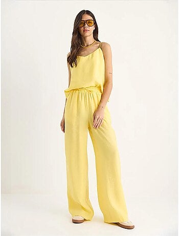 Conjunto coordinado de camisola sin mangas y pantalón de pernera ancha lucci