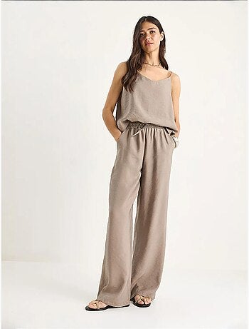 Conjunto coordinado de camisola sin mangas y pantalón de pernera ancha lucci