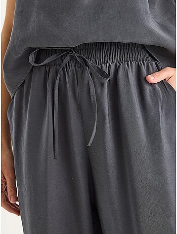 Conjunto coordinado de camisola sin mangas y pantalón de pernera ancha lucci