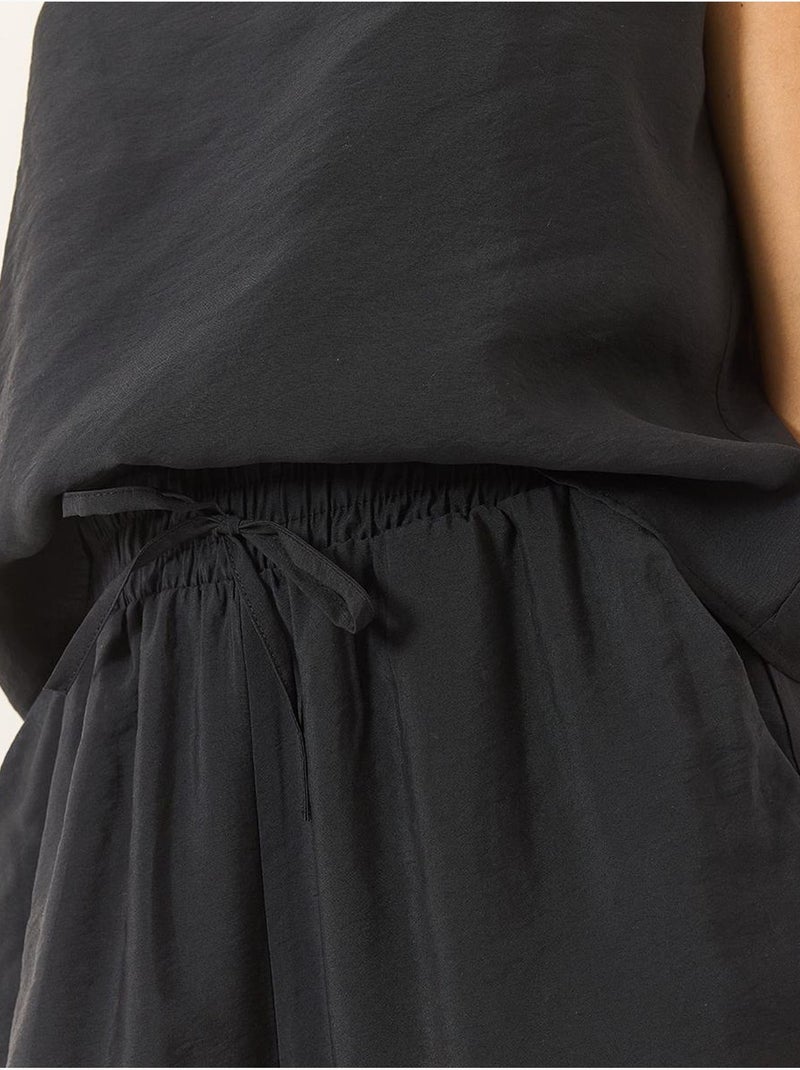 Conjunto coordinado de camisola sin mangas y pantalón de pernera ancha lucci Negro - Kiabi