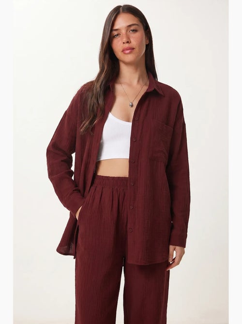 Conjunto coordinado de dos piezas de talle alto con pierna ancha y cuello camisero istanbul - Kiabi Conjunto coordinado de dos piezas de talle alto con pierna ancha y cuello camisero istanbul - Kiabi