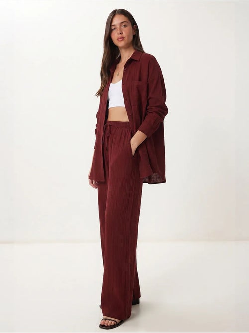 Conjunto coordinado de dos piezas de talle alto con pierna ancha y cuello camisero istanbul - Kiabi Conjunto coordinado de dos piezas de talle alto con pierna ancha y cuello camisero istanbul - Kiabi