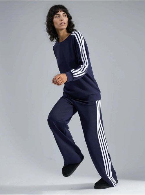 Conjunto coordinado de sudadera a rayas con cuello redondo y pantalón de pernera recta hiccup - Kiabi Conjunto coordinado de sudadera a rayas con cuello redondo y pantalón de pernera recta hiccup - Kiabi