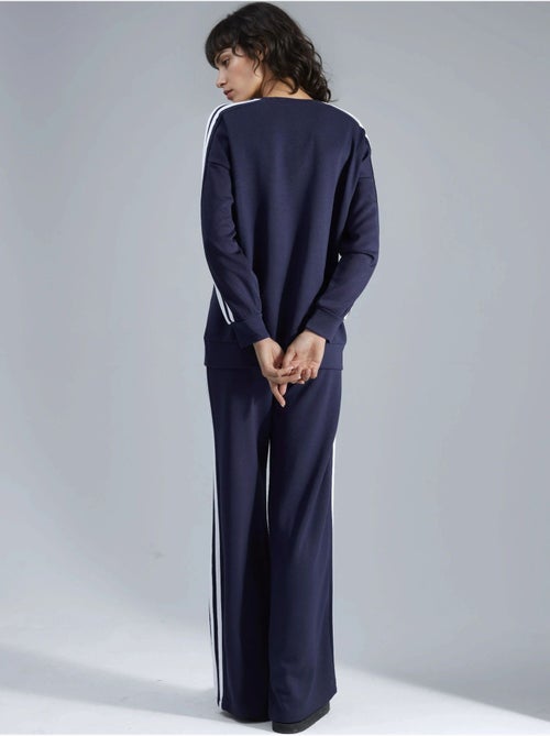 Conjunto coordinado de sudadera a rayas con cuello redondo y pantalón de pernera recta hiccup - Kiabi Conjunto coordinado de sudadera a rayas con cuello redondo y pantalón de pernera recta hiccup - Kiabi