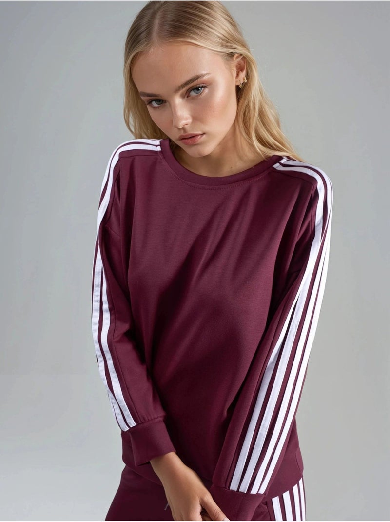 Conjunto coordinado de sudadera a rayas con cuello redondo y pantalón de pernera recta hiccup Rojo burdeos - Kiabi