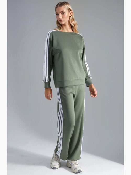 Conjunto coordinado de sudadera a rayas con cuello redondo y pantalón de pernera recta hiccup - Kiabi Conjunto coordinado de sudadera a rayas con cuello redondo y pantalón de pernera recta hiccup - Kiabi