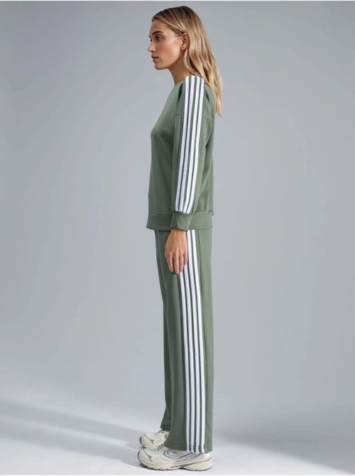 Conjunto coordinado de sudadera a rayas con cuello redondo y pantalón de pernera recta hiccup - Kiabi Conjunto coordinado de sudadera a rayas con cuello redondo y pantalón de pernera recta hiccup - Kiabi