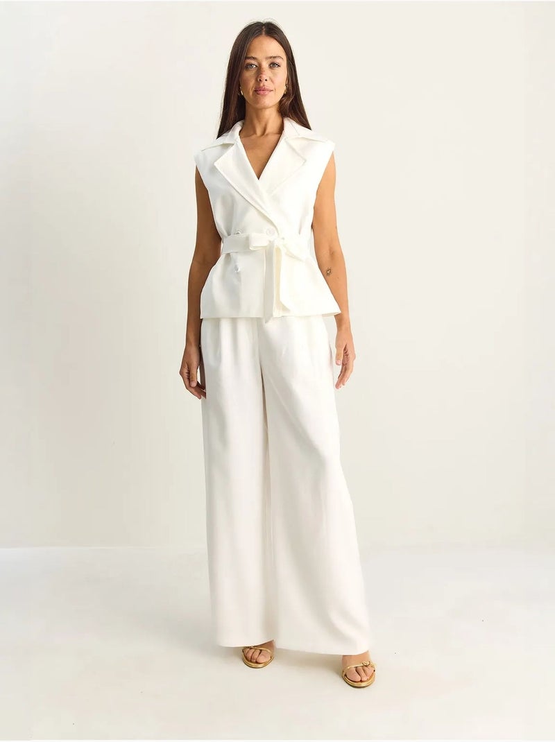 Conjunto coordinado de talle alto con pierna ancha y cuello chal lucci Marfil - Kiabi
