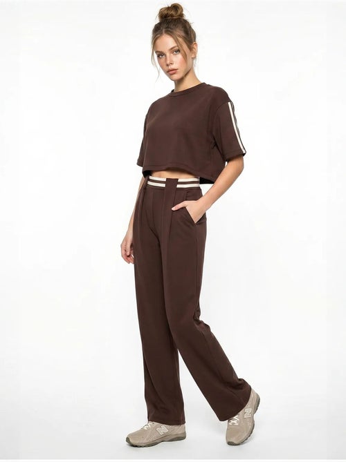 Conjunto de 2 piezas con camiseta de cuello redondo y pantalones de pernera ancha lucci - Kiabi Conjunto de 2 piezas con camiseta de cuello redondo y pantalones de pernera ancha lucci - Kiabi