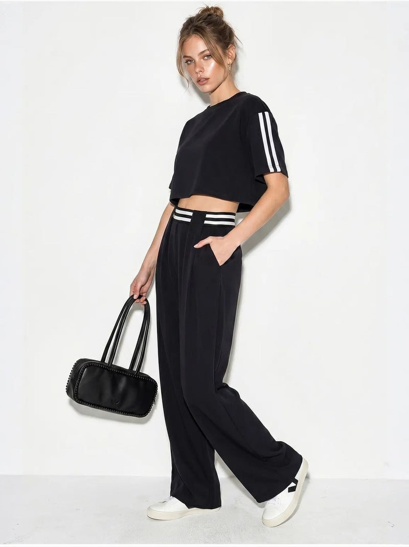 Conjunto de 2 piezas con camiseta de cuello redondo y pantalones de pernera ancha lucci Negro - Kiabi