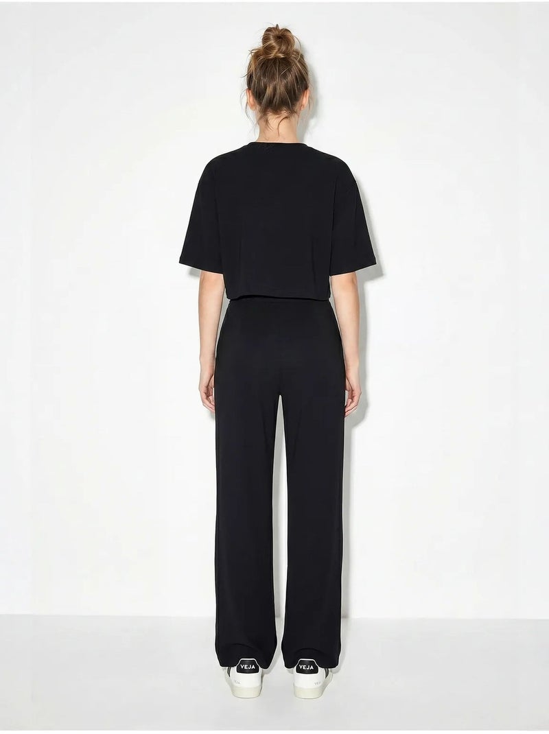 Conjunto de 2 piezas con camiseta de cuello redondo y pantalones de pernera ancha lucci Negro - Kiabi