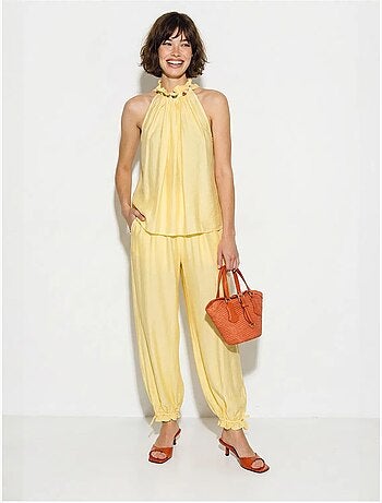 Conjunto de blusa halter y pantalones de tiro alto lucci