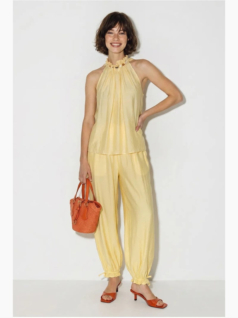 Conjunto de blusa halter y pantalones de tiro alto lucci Amarillo limón - Kiabi