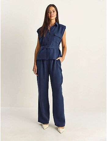 Conjunto de blusa sin mangas con cinturón y pantalón de pernera ancha lucci