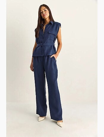 Conjunto de blusa sin mangas con cinturón y pantalón de pernera ancha lucci