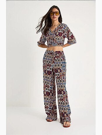 Conjunto de blusa y pantalón corto estampado lucci