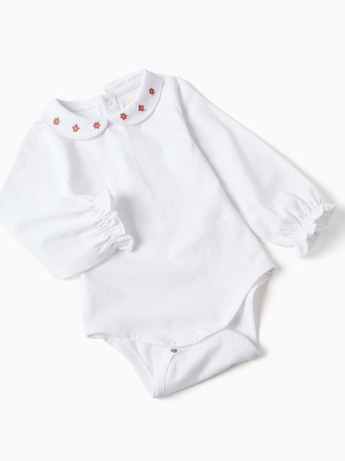 Conjunto de body de algodón y pantalón de punto - Kiabi Conjunto de body de algodón y pantalón de punto - Kiabi