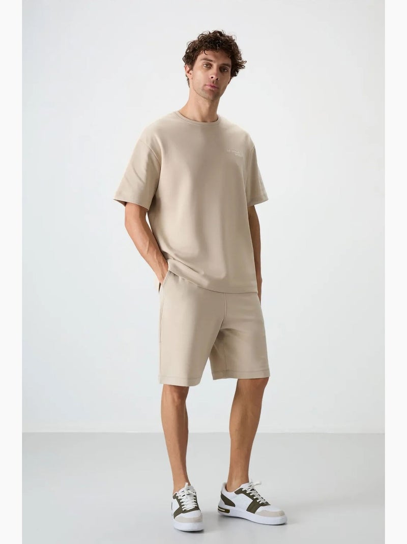 Conjunto de camiseta de manga corta oversize y shorts tommy Beige arcilla - Kiabi