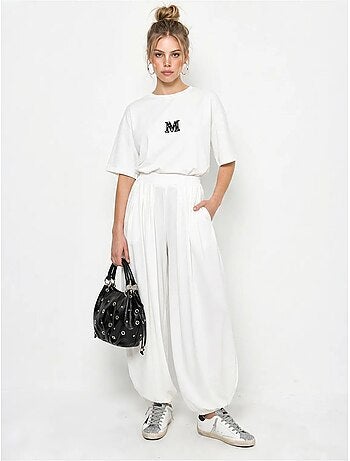 Conjunto de camiseta oversize de cuello redondo y pantalón de pernera ancha lucci