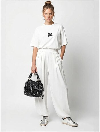 Conjunto de camiseta oversize de cuello redondo y pantalón de pernera ancha lucci