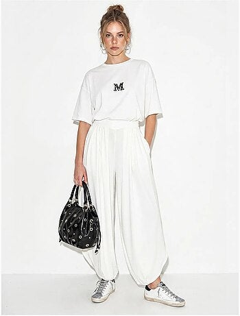 Conjunto de camiseta oversize de cuello redondo y pantalón de pernera ancha lucci