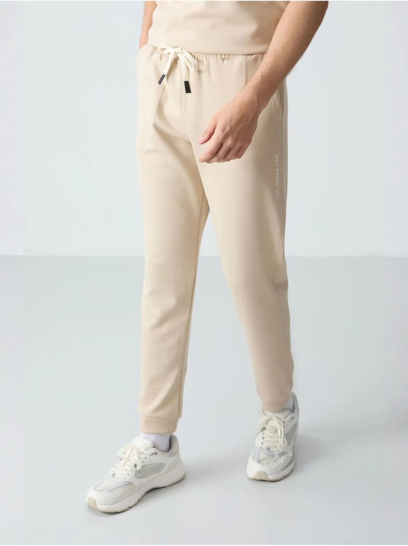 Conjunto de camiseta oversize y pantalón para hombre tommy Beige arcilla - Kiabi