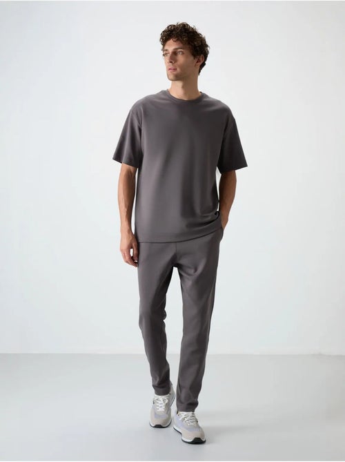 Conjunto de camiseta oversize y pantalón para hombre tommy - Kiabi Conjunto de camiseta oversize y pantalón para hombre tommy - Kiabi