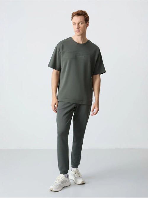 Conjunto de camiseta oversize y pantalón para hombre tommy - Kiabi Conjunto de camiseta oversize y pantalón para hombre tommy - Kiabi