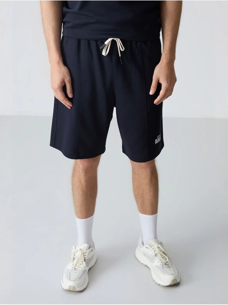 Conjunto de camiseta oversize y shorts para hombre tommy Azul marino - Kiabi
