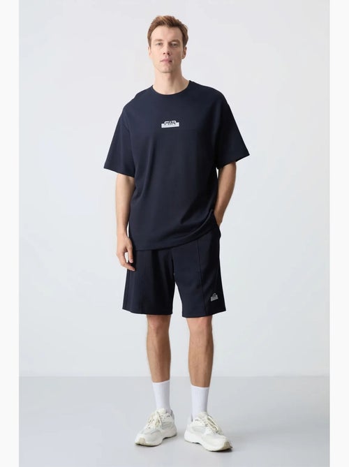 Conjunto de camiseta oversize y shorts para hombre tommy - Kiabi Conjunto de camiseta oversize y shorts para hombre tommy - Kiabi