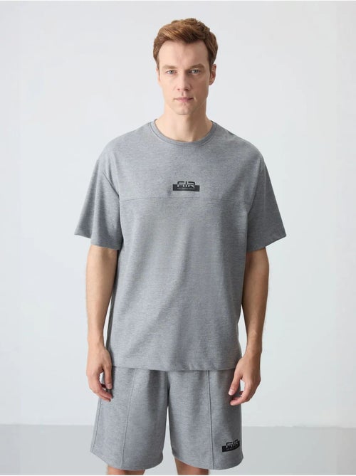 Conjunto de camiseta oversize y shorts para hombre tommy - Kiabi Conjunto de camiseta oversize y shorts para hombre tommy - Kiabi