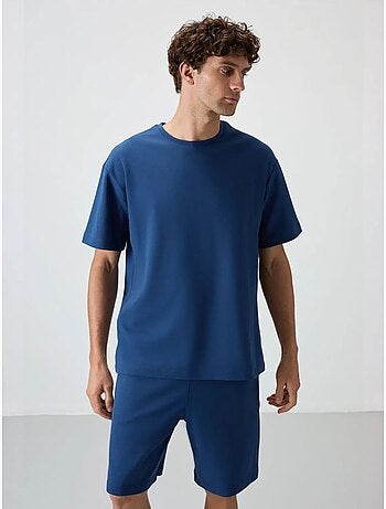 Conjunto de camiseta oversize y shorts tommy