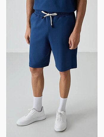 Conjunto de camiseta oversize y shorts tommy