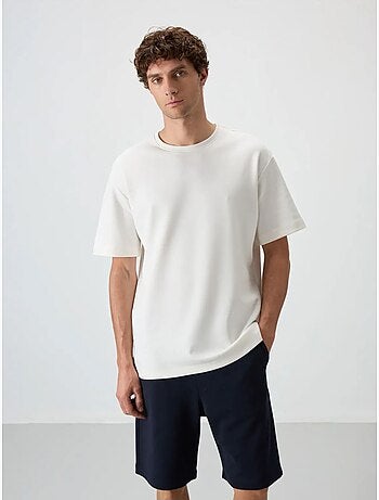 Conjunto de camiseta oversize y shorts tommy
