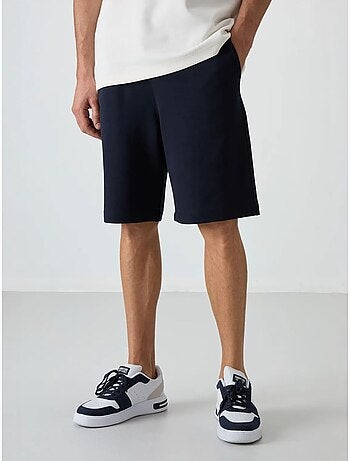 Conjunto de camiseta oversize y shorts tommy