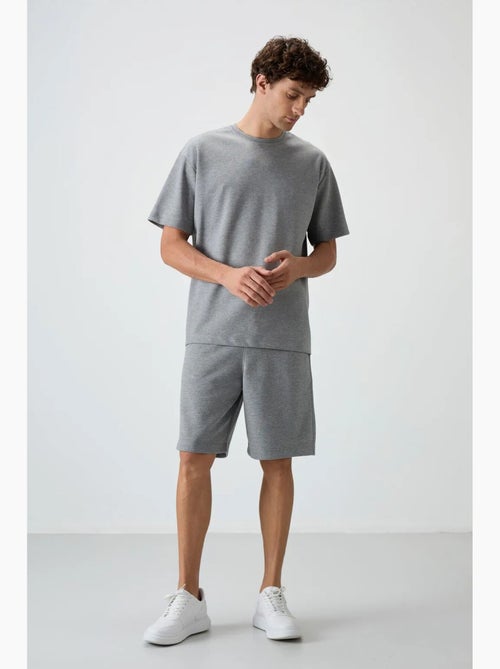 Conjunto de camiseta oversize y shorts tommy - Kiabi Conjunto de camiseta oversize y shorts tommy - Kiabi