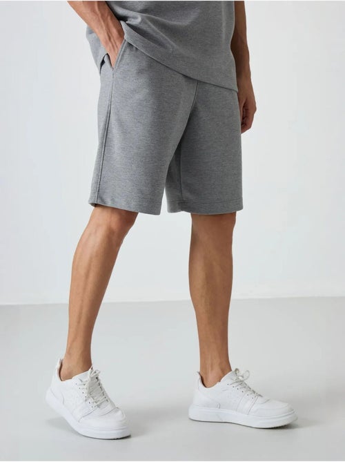 Conjunto de camiseta oversize y shorts tommy - Kiabi Conjunto de camiseta oversize y shorts tommy - Kiabi