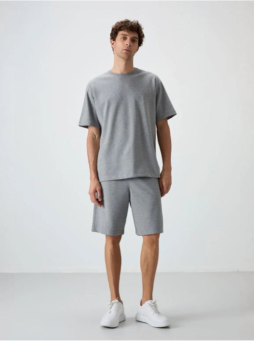 Conjunto de camiseta oversize y shorts tommy - Kiabi Conjunto de camiseta oversize y shorts tommy - Kiabi