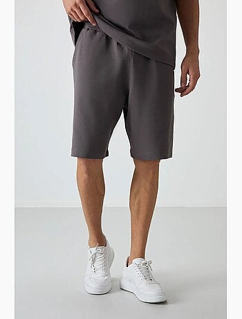 Conjunto de camiseta oversize y shorts tommy