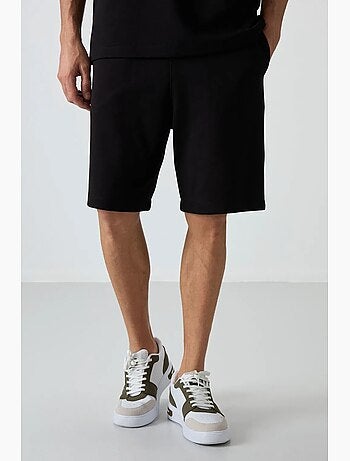 Conjunto de camiseta oversize y shorts tommy