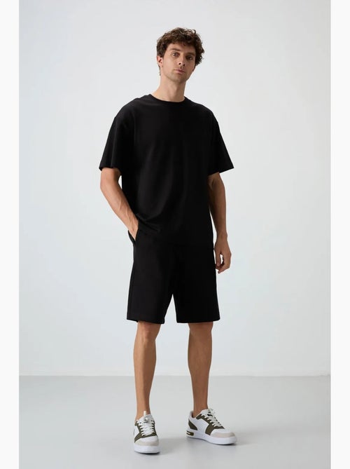 Conjunto de camiseta oversize y shorts tommy - Kiabi Conjunto de camiseta oversize y shorts tommy - Kiabi