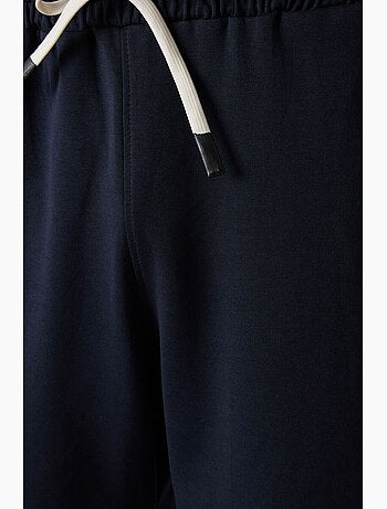Conjunto de camiseta oversize y shorts tommy