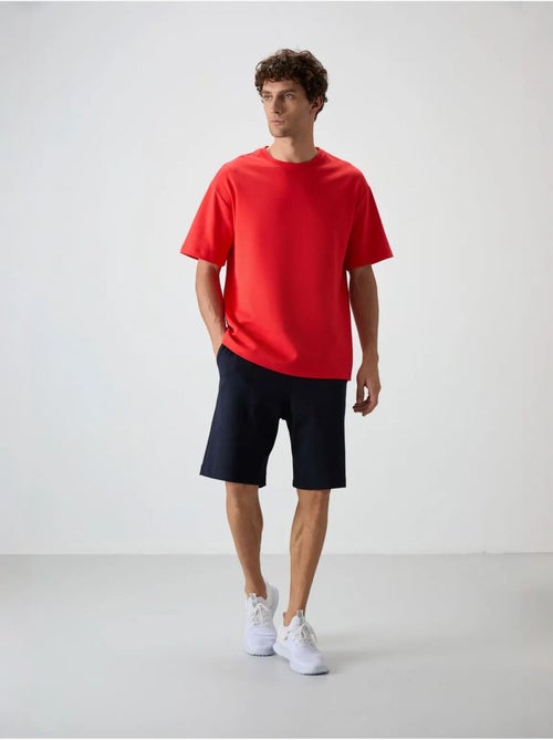 Conjunto de camiseta oversize y shorts tommy - Kiabi Conjunto de camiseta oversize y shorts tommy - Kiabi