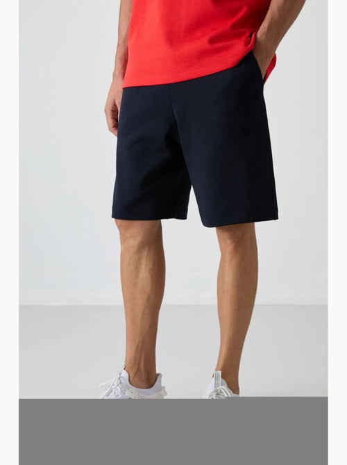 Conjunto de camiseta oversize y shorts tommy - Kiabi Conjunto de camiseta oversize y shorts tommy - Kiabi