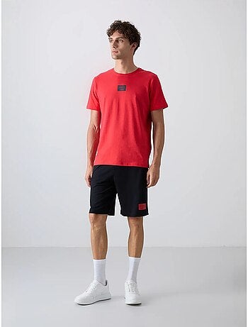 Conjunto de camiseta y shorts de punto jersey de algodón estampado tommy