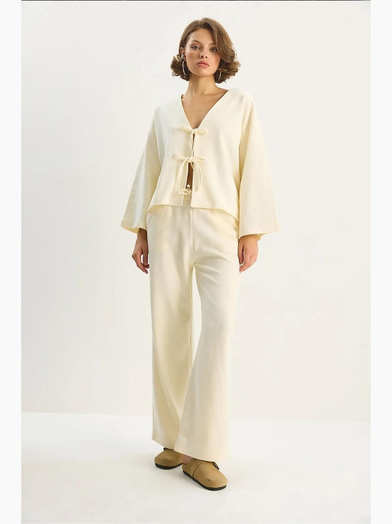 Conjunto de cárdigan de punto con cuello en v y pantalones de pierna ancha lucci Beige claro - Kiabi