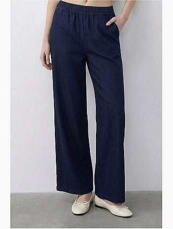 Conjunto de chaleco con escote en v con cinturón y pantalón de pernera ancha lucci