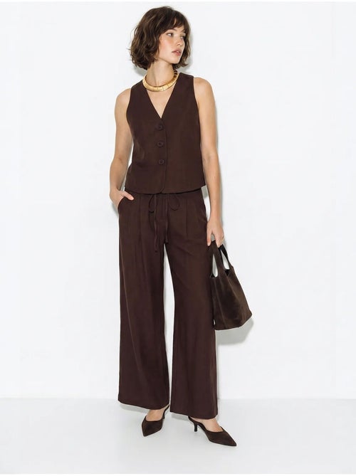 Conjunto de chaleco de algodón y pantalón de pernera ancha lucci - Kiabi Conjunto de chaleco de algodón y pantalón de pernera ancha lucci - Kiabi