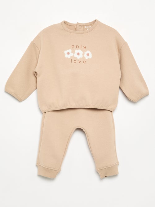 Conjunto de chándal de 2 piezas - Sudadera + pantalón - Kiabi Conjunto de chándal de 2 piezas - Sudadera + pantalón - Kiabi
