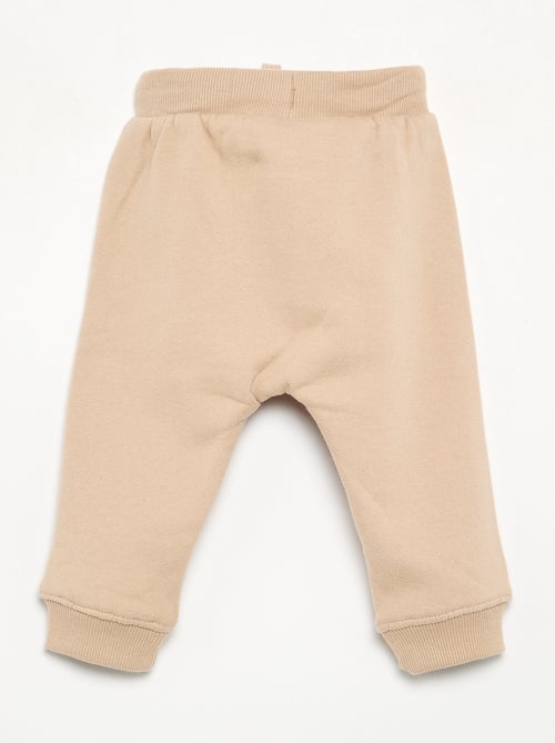 Conjunto de chándal de 2 piezas - Sudadera + pantalón - Kiabi Conjunto de chándal de 2 piezas - Sudadera + pantalón - Kiabi